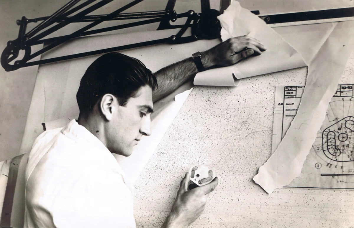 Teresio at his drafting table