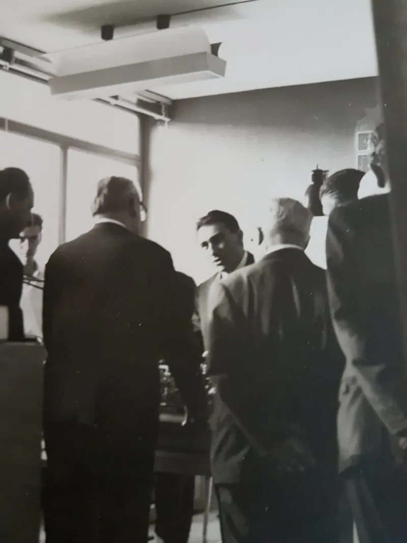 President Gronchi, seen from behind, presents Teresio with the Cavaliere honour